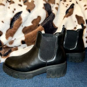 Black Chelsea boots with memory foam.